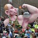 A carnival float depicting Russia's president Vladimir Putin , showing his muscles and a bomb, reading 'Crimea' , drives during the traditional carniv
