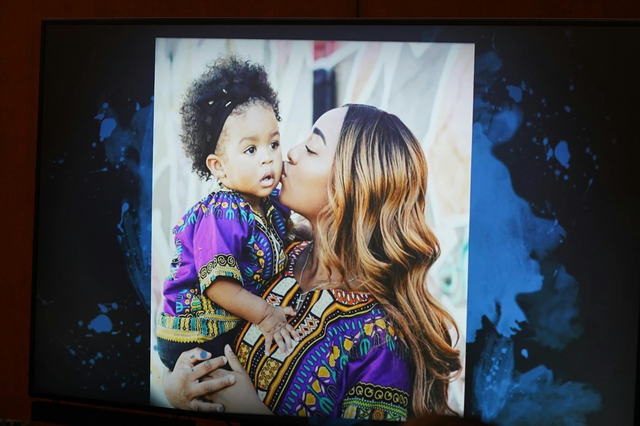 A photo and video presentation was shown to the court prior to sentencing. Former Hennepin County probation officer, Elsa Segura, is sentenced, Tuesday, Nov. 9, 2021, in Hennepin County Court, Minneapolis, Minn., for luring Realtor, Monique Baugh, to a fake home showing where she was kidnapped and murdered.