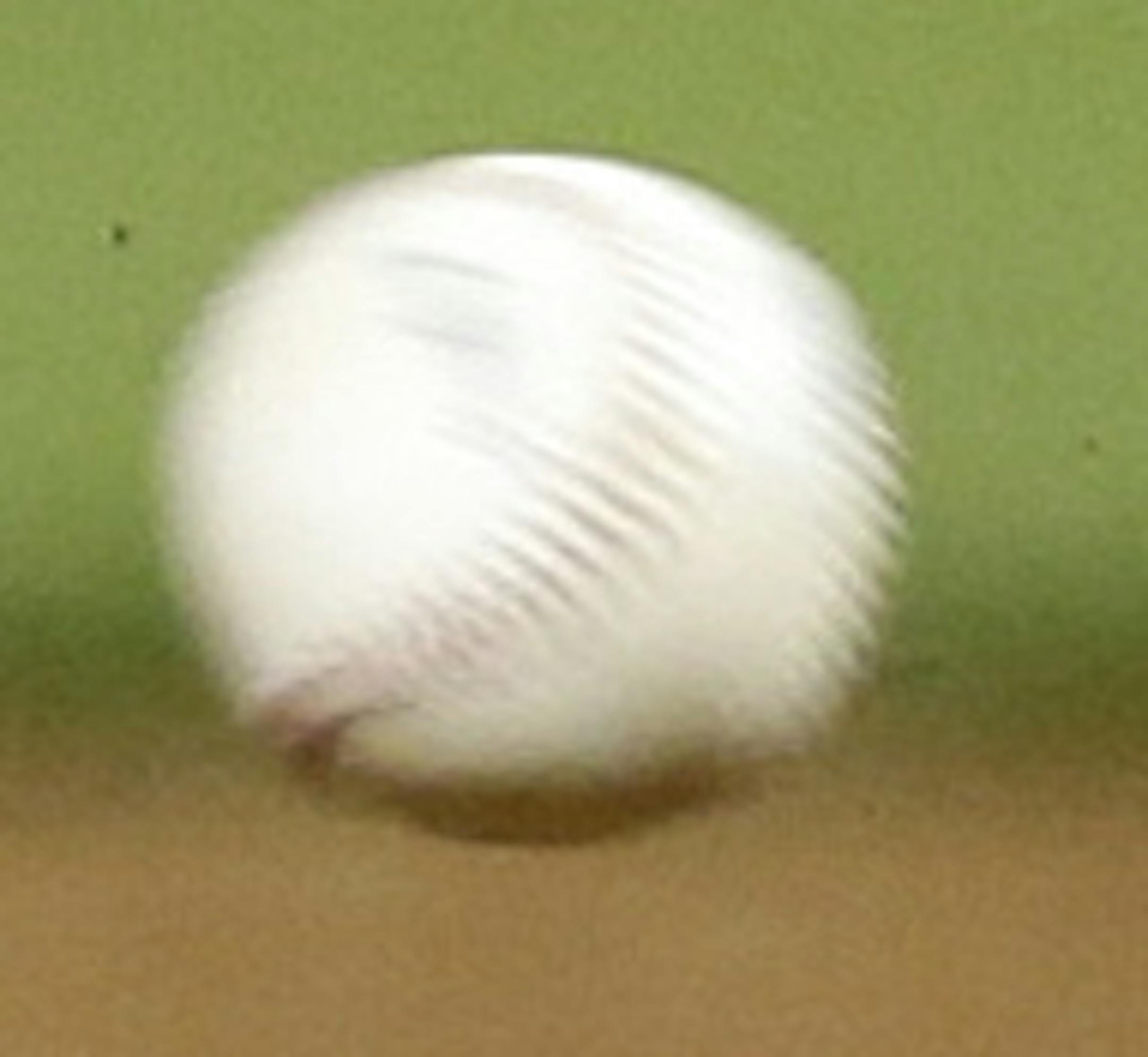 Milwaukee Brewers shortstop Jean Segura fields a ground ball hit by Cincinnati Reds' Devin Mesoraco in the fourth inning of a baseball game, Wednesday, Sept. 24, 2014, in Cincinnati. Segura threw Mesoraco out at first. (AP Photo/Al Behrman)