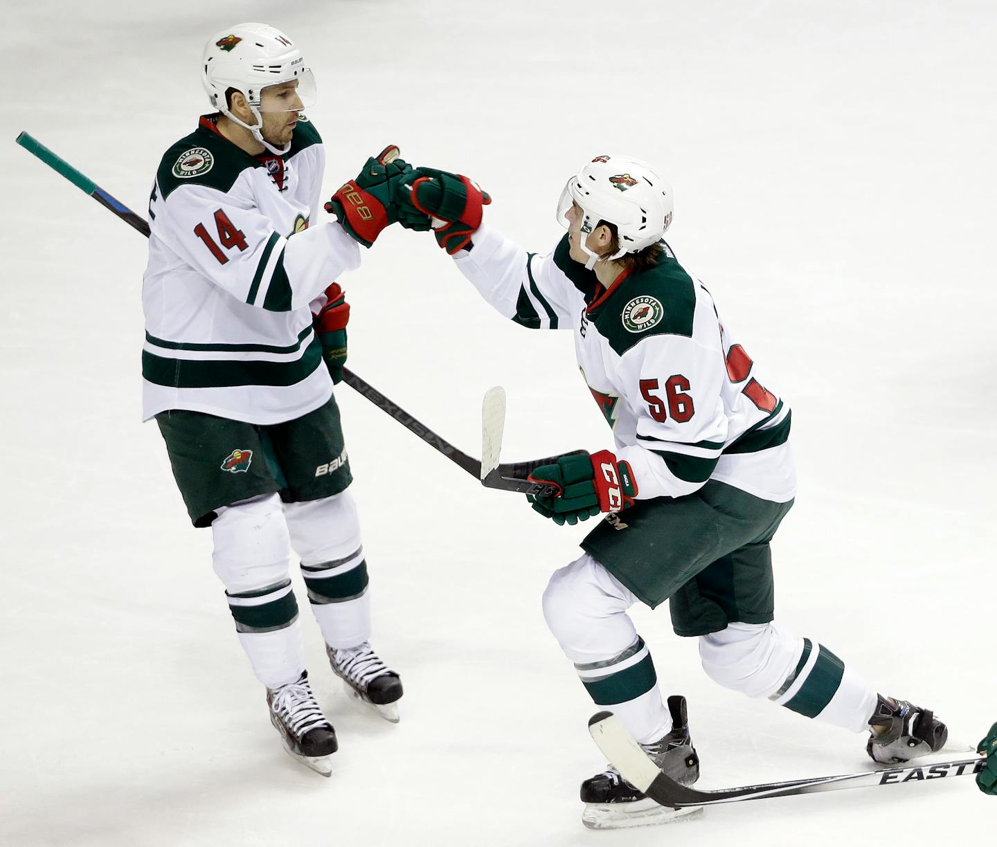 Wild forward Justin Fontaine (14, with Erik Haula) will miss four to six weeks because of a sprained medial collateral ligament in his left knee.