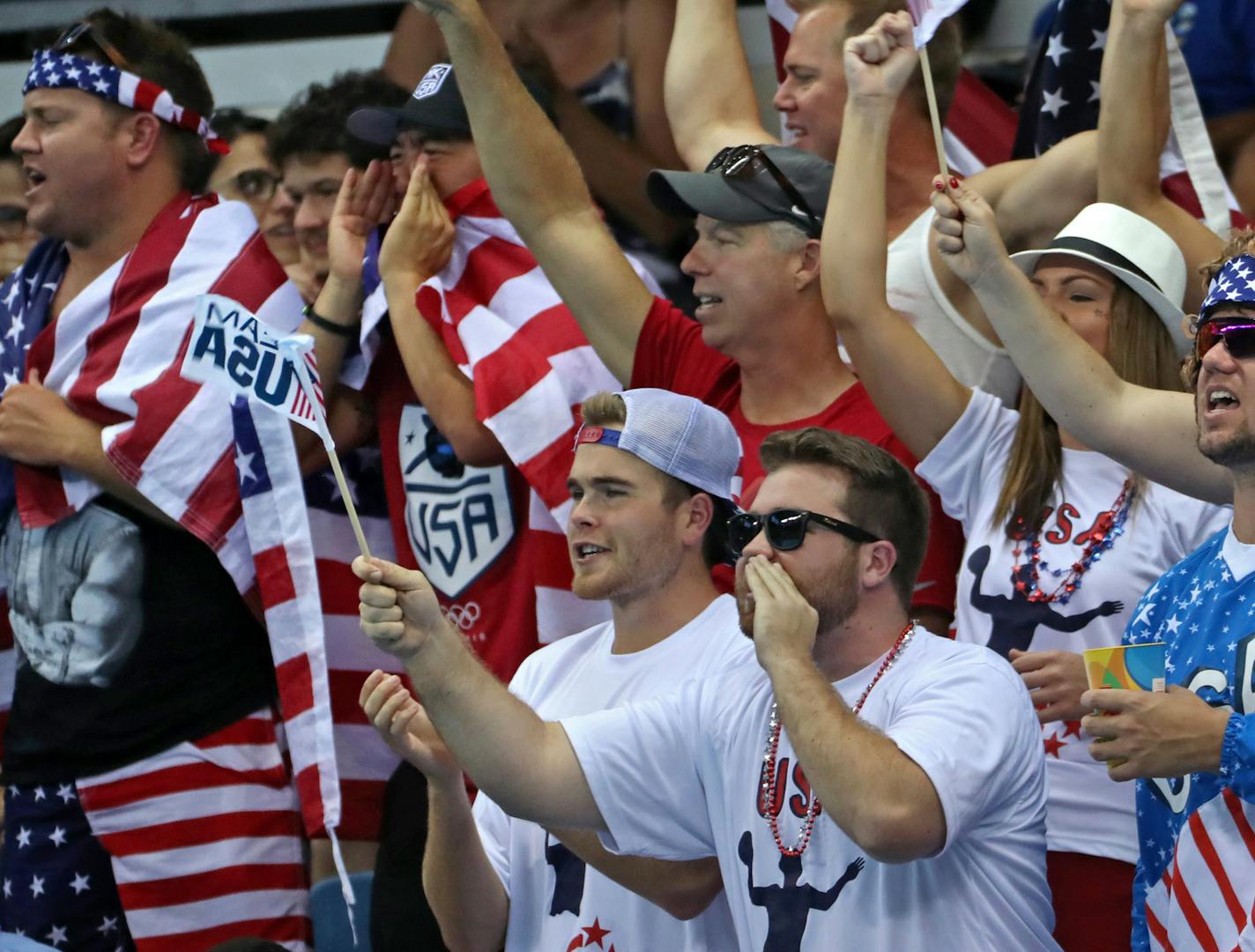 The U.S. women's water polo team secured a semifinal berth with a 13-3 victory over Brazil Monday afternoon at the Olympic Aquatics Stadium. Here, team USA had a good pack of supporters at the game on Monday. ] 2016 Summer Olympic Games - Rio Brazil brian.peterson@startribune.com Rio de Janeiro, Brazil - 08/15/2016