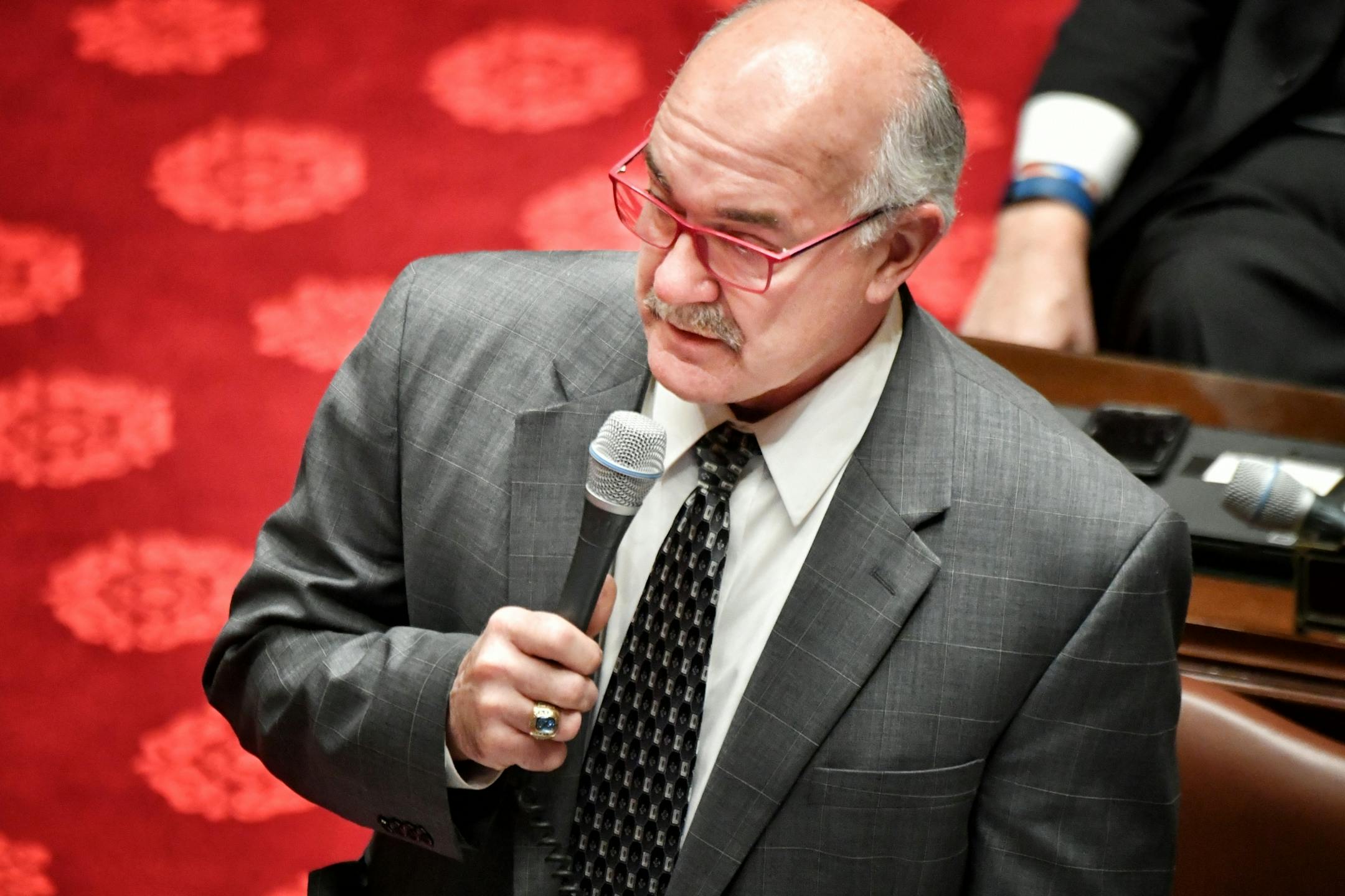 Senator David Tomassoni, DFL, Chisolm, spoke against the bill and the effect it would have on small "mom and pop" liquor stores in his district on the Iron Range.