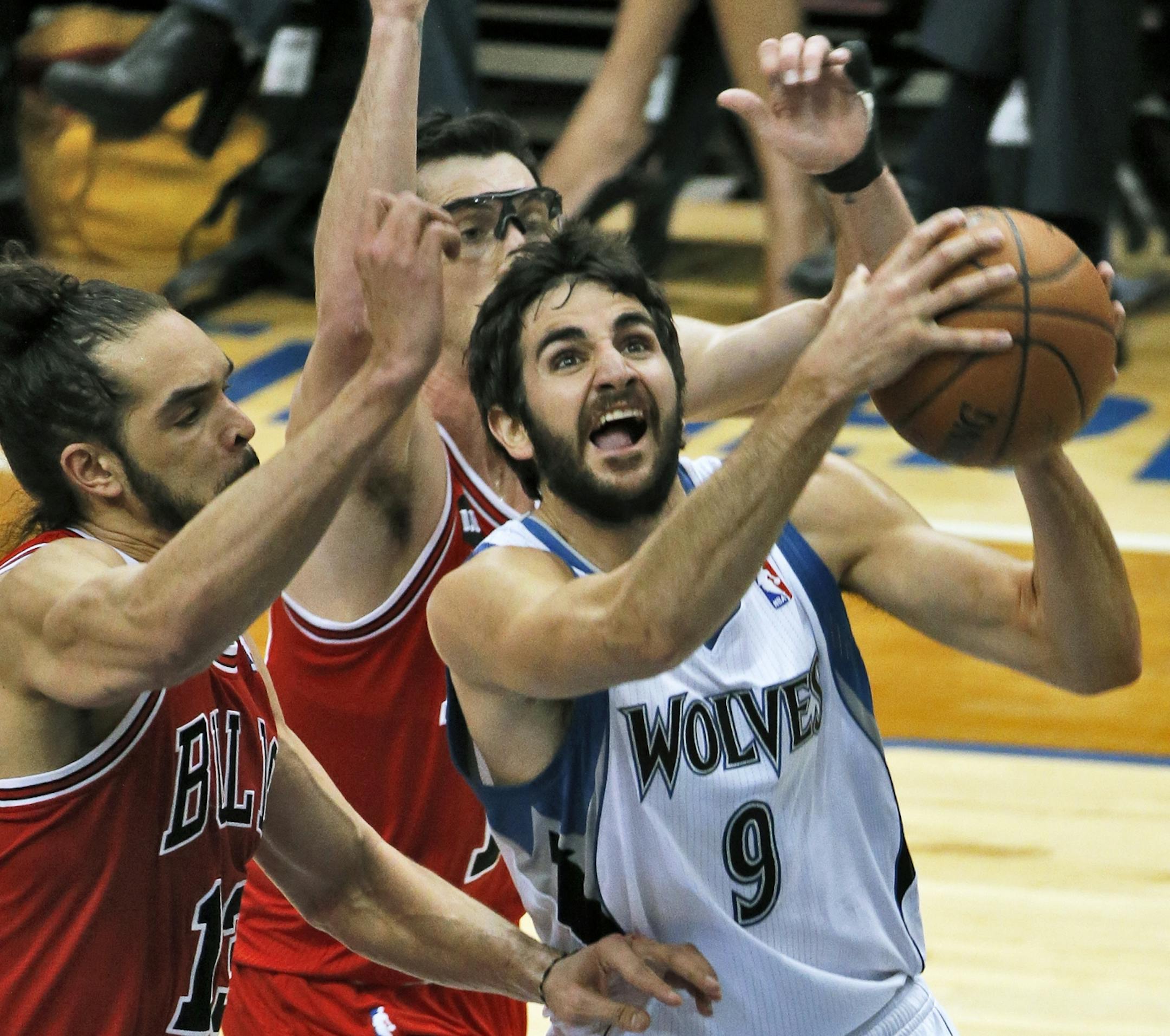 Wolves Ricky Rubio fought through the Bulls defense for a first half layup.