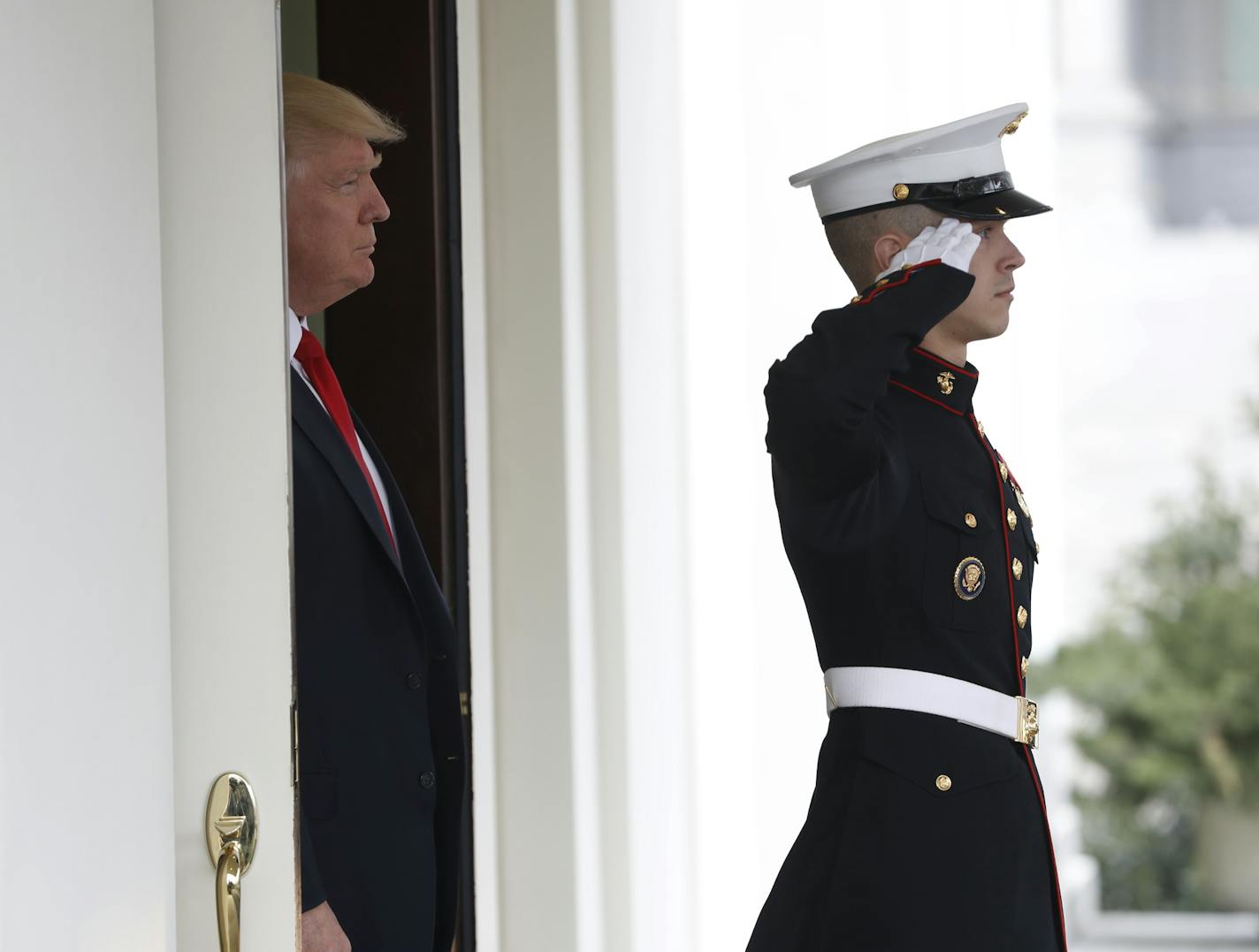 President Donald Trump awaits the arrival of Danish Prime Minister Lars Lokke Rasmussen at the White House in Washington, Thursday, March 30, 2017. (AP Photo/Pablo Martinez Monsivais)