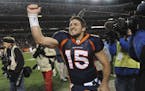 Denver Broncos quarterback Tim Tebow (15) celebrates after beating the Pittsburgh Steelers 29-23 in overtime of an NFL wild card playoff football game