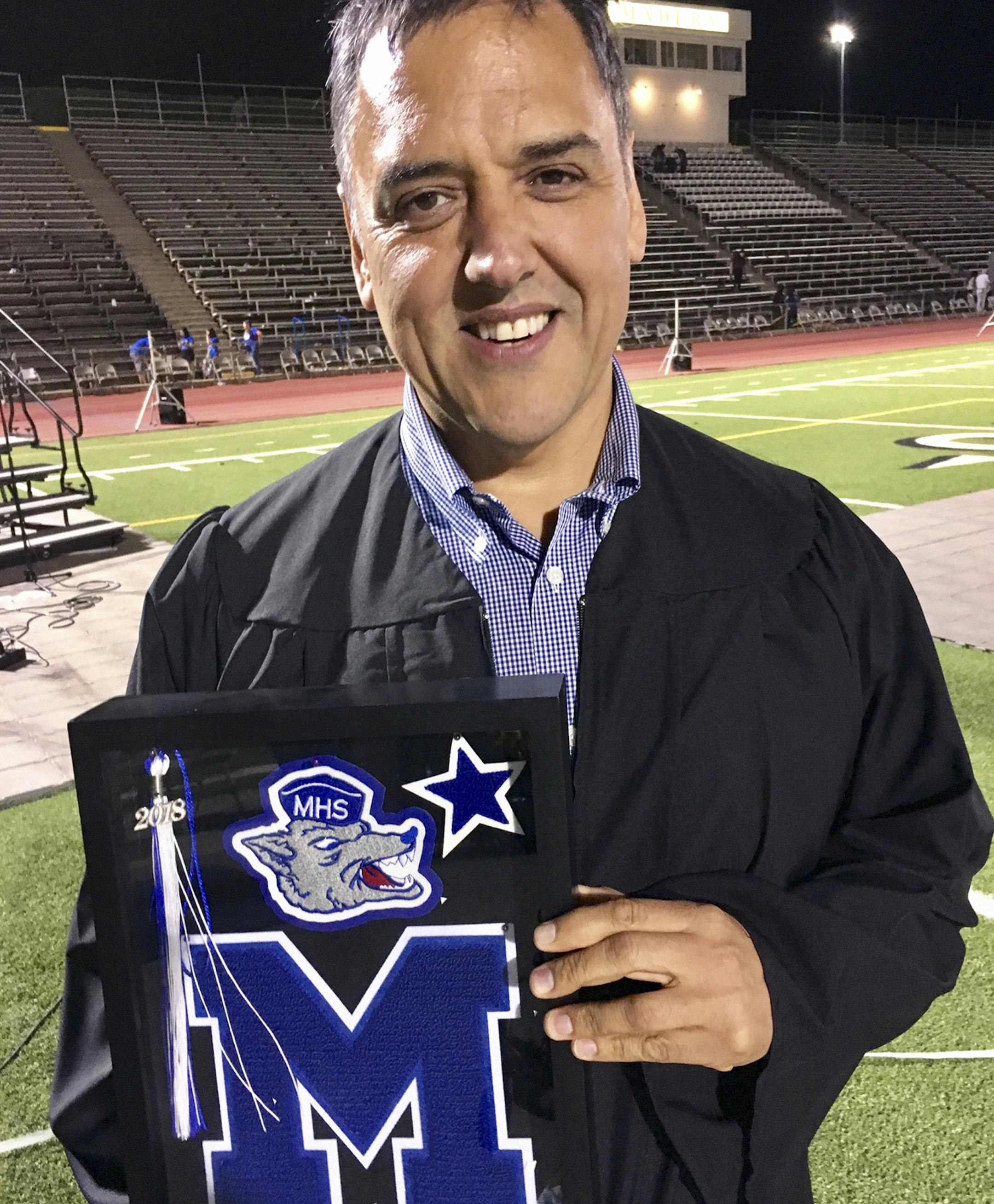 Clyde Rodriguez told Madera High graduates: "As you write this next chapter, never forget that you hold the pen."