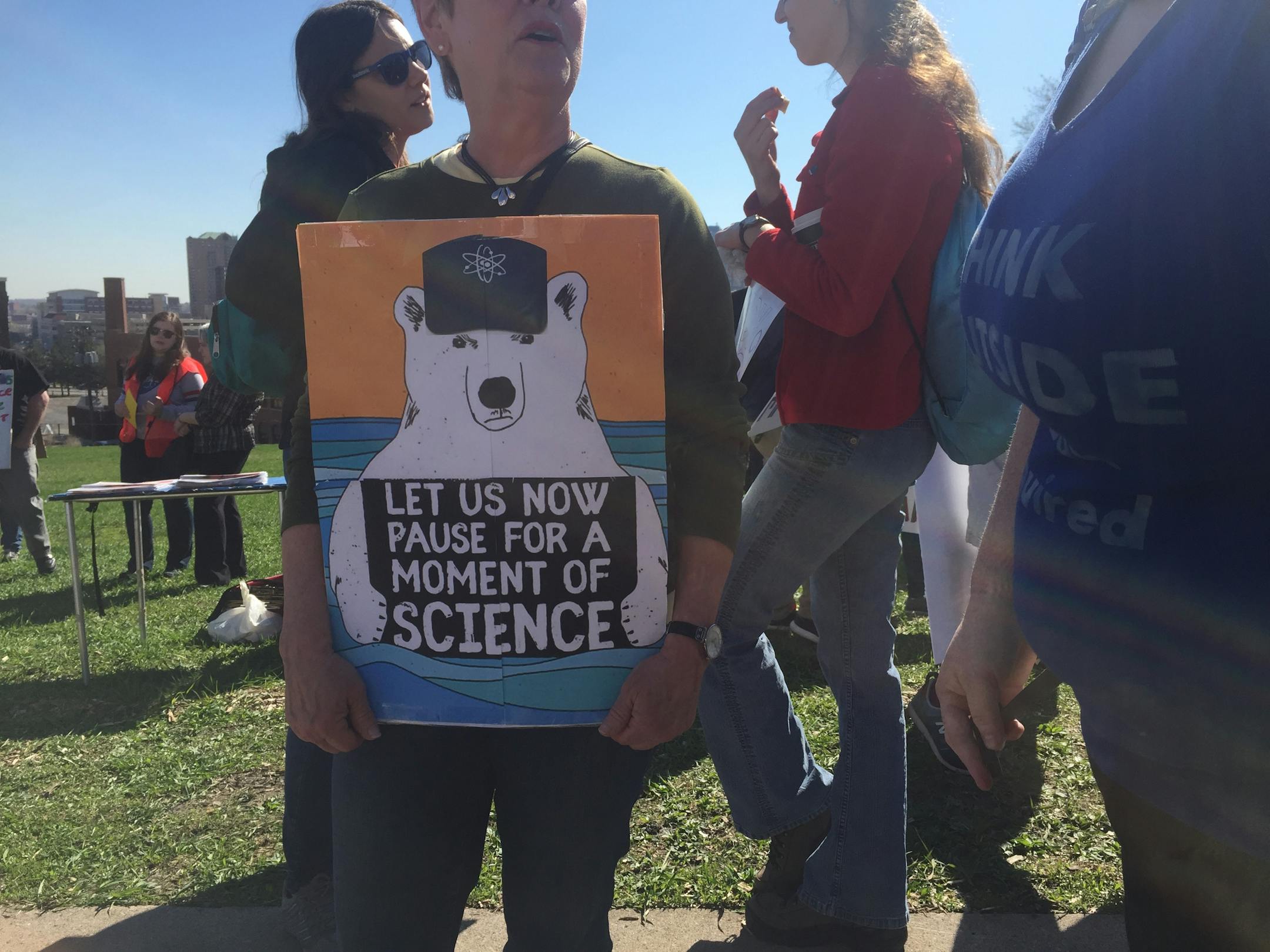 People congregate Saturday in Cathedral Hill Park for the March for Science in St. Paul.