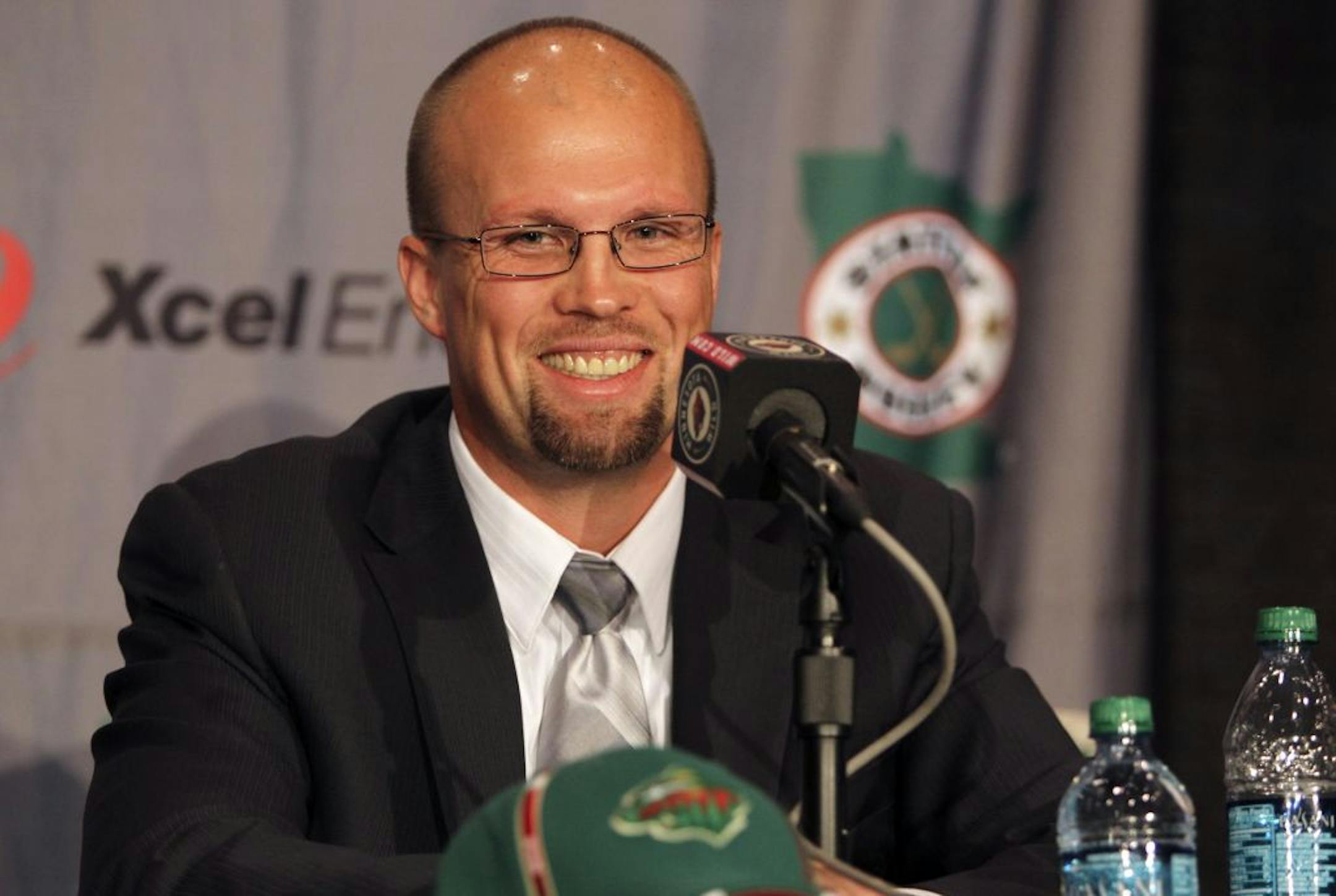 The Minnesota Wild introduce their new head coach Mike Yeo to the media. At 37, Yeo is the youngest head coach in the NHL.Here, Yeo cracks a smile during a relatively serious introduction.