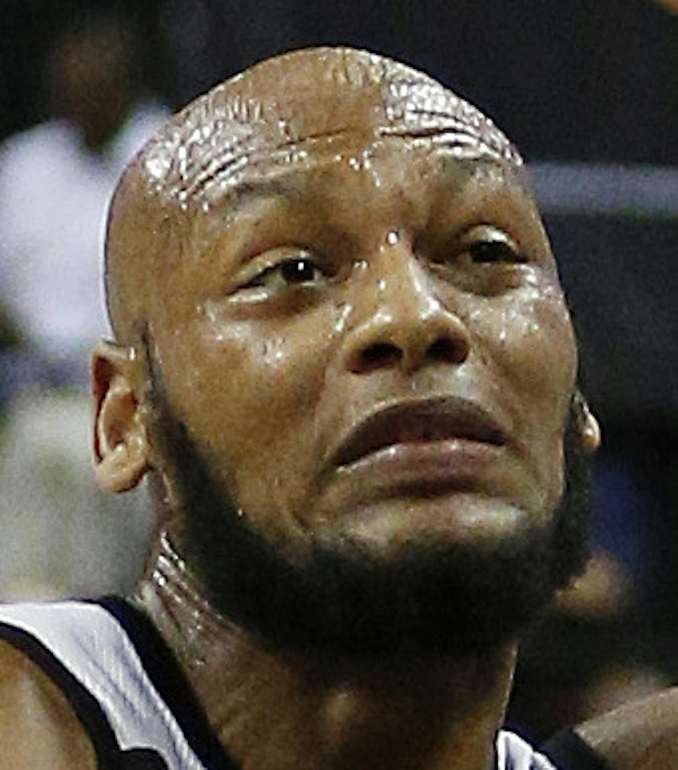 Minnesota Timberwolves’ Adreian Payne, left, and Los Angeles Lakers’ Julius Randle dive for the ball during the first half of their NBA summer league basketball game Friday, July 10, 2015, in Las Vegas. (AP Photo/John Locher)