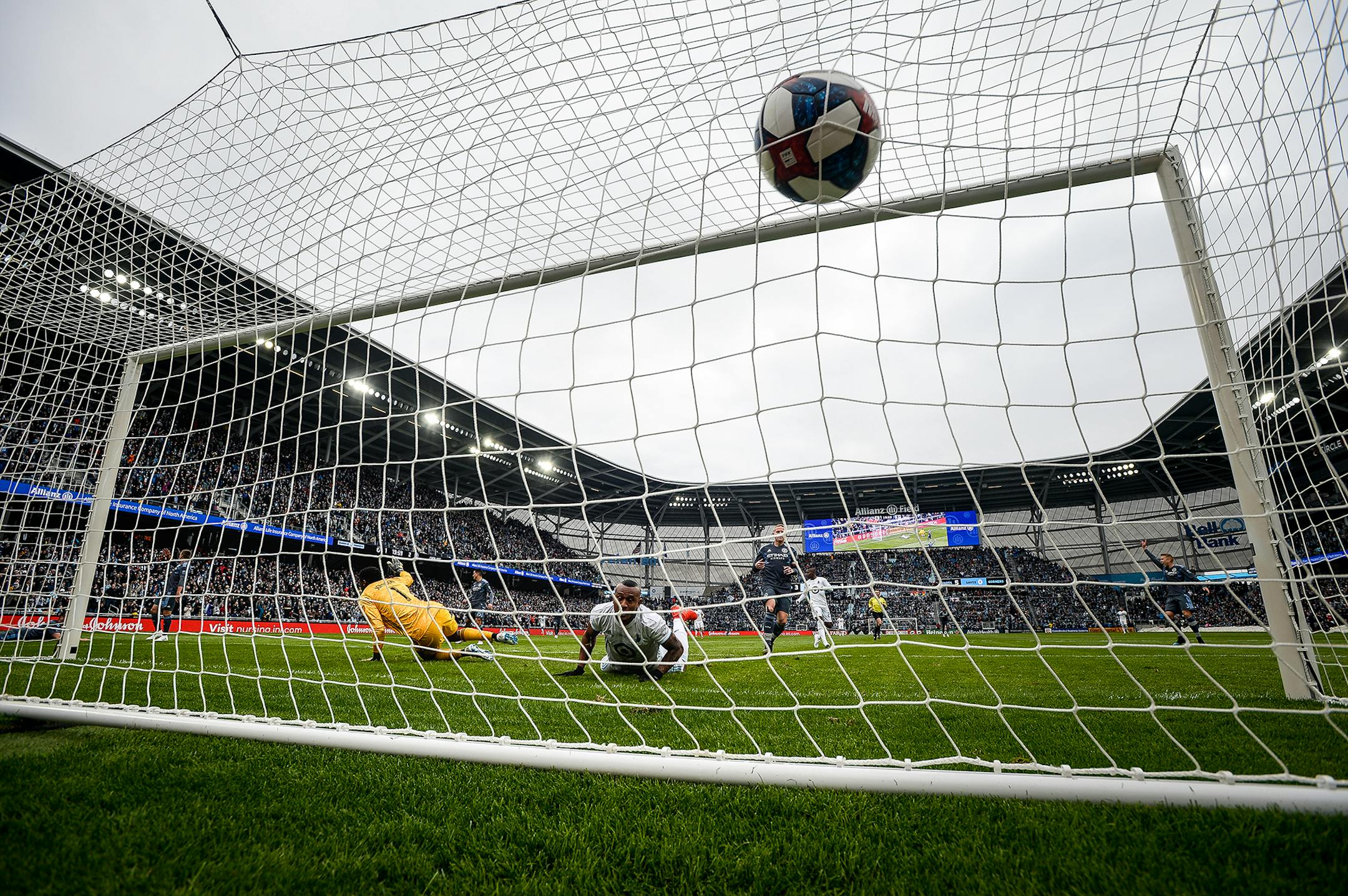 Minnesota United's Angelo Rodriguez (9) scores against NYC FC goalkeeper Sean Johnson (1) off a diving header in the first half on Saturday, April 13, 2019, at Allianz Field in St. Paul, Minn. The game ended in a 3-3 draw. (Aaron Lavinsky/Minneapolis Star Tribune/TNS)