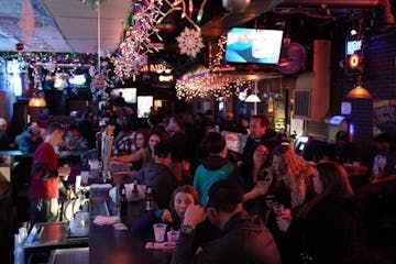 Patrons talked with one another as it started to get busy at Danno's bar on a recent Friday night.