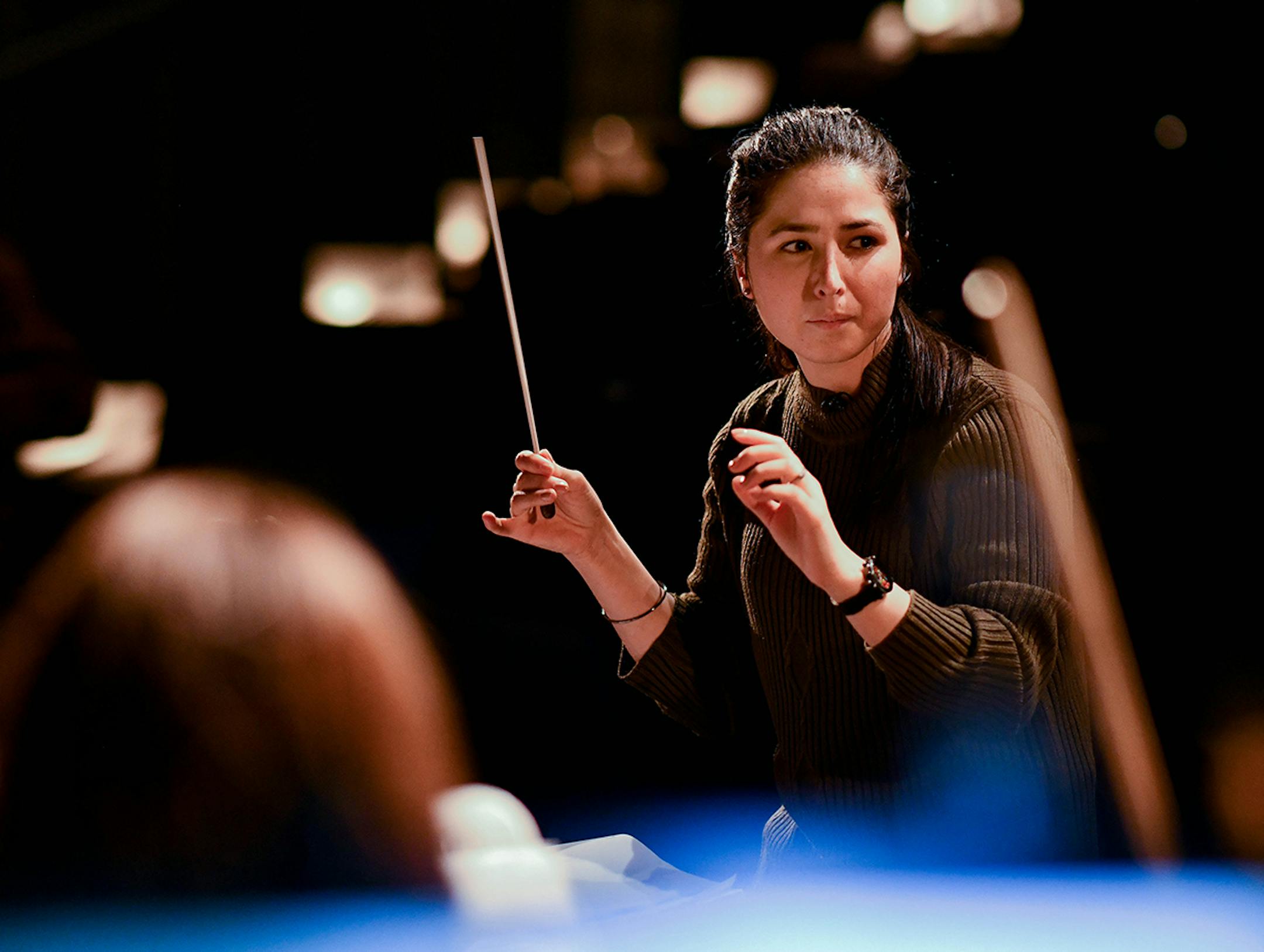 Negin Khpalwak conducts members of Zohra Afghanistan's first all-female orchestra as they practice at the British Museum in central London on March 15, 2019. (Andrew Parsons/i-Images/Zuma Press/TNS)