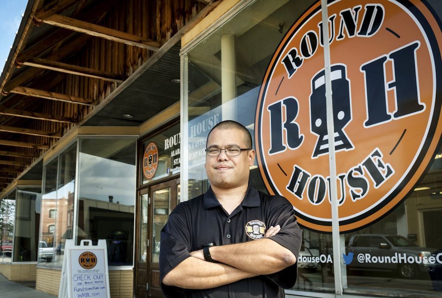 In this March 31, 2015 photo provided by Art Meripol, Kyle Sandler poses for a photo at The Round House in Opelika, Ala. Sandler, who launched the business incubator called the Round House plead guilty to charges of taking about $1.9 million from investors. Authorities say Sandler used the money to pay for child care, rent, cars and more. Sandler now admits falsely portraying himself as a one-time Google executive to reel in a whole town.