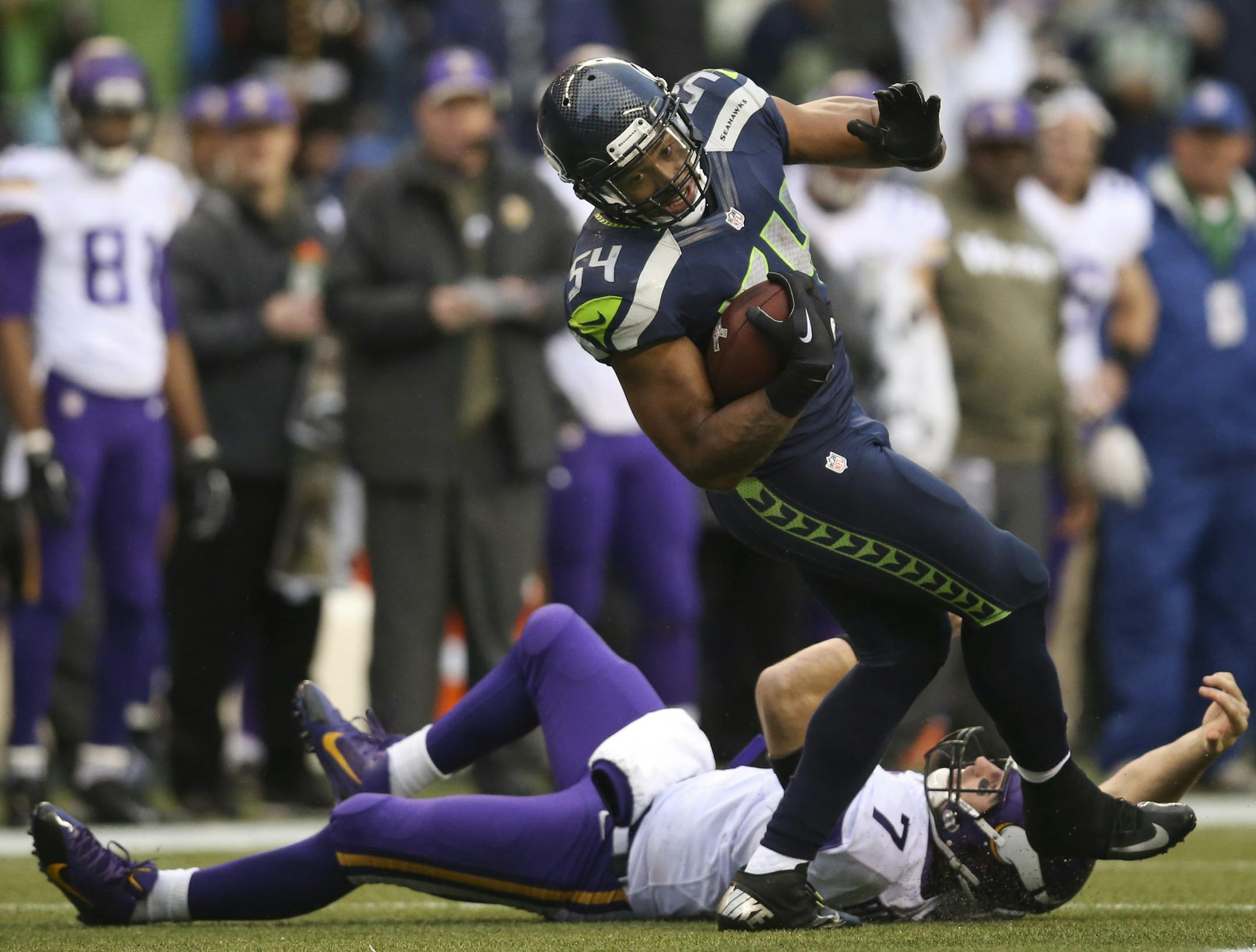 The Minnesota Vikings lost 41-20 to the Seattle Seahawks in an NFL game Sunday afternoon, November 17, 2013 at CenturyLink Field in Seattle. Seattle Seahawks middle linebacker Bobby Wagner (54) broke a tackle by Minnesota Vikings quarterback Christian Ponder (7) after intercepting Ponder's fourth quarter pass intended for Adrian Peterson. Wagner returned the ball 9 yards and the Seahawks scored two plays later. ] JEFF WHEELER &#x201a;&#xc4;&#xa2; jeff.wheeler@startribune.com