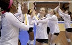 Minnesota setter Kylie Miller (14) celebrated Minnesota's 3-2 win over Florida in the third round of the NCAA volleyball tournament on Friday, Dec. 13