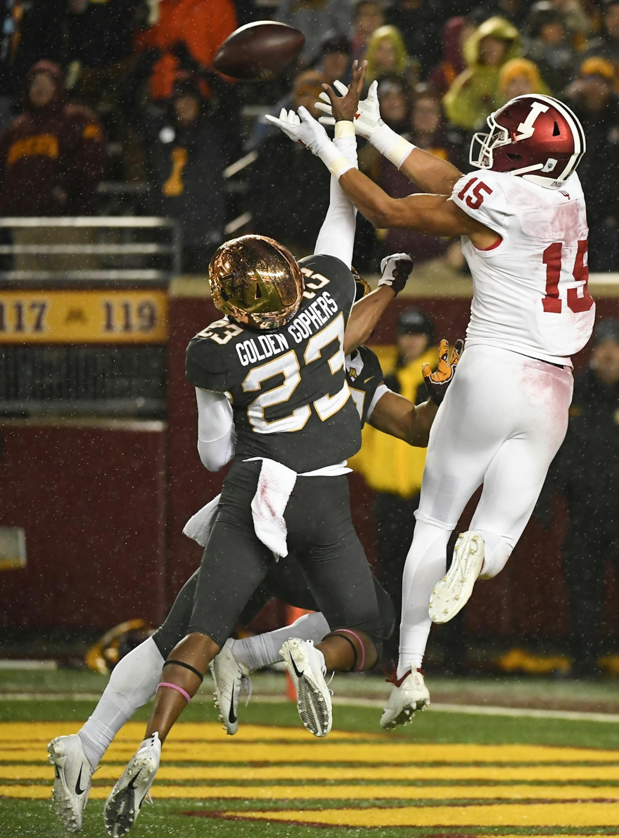 Minnesota Golden Gophers defensive back Jacob Huff (2) and defensive back Jordan Howden (23) broke up a pass in the endzone intended for Indiana Hoosiers wide receiver Nick Westbrook (15) in the first quarter.
