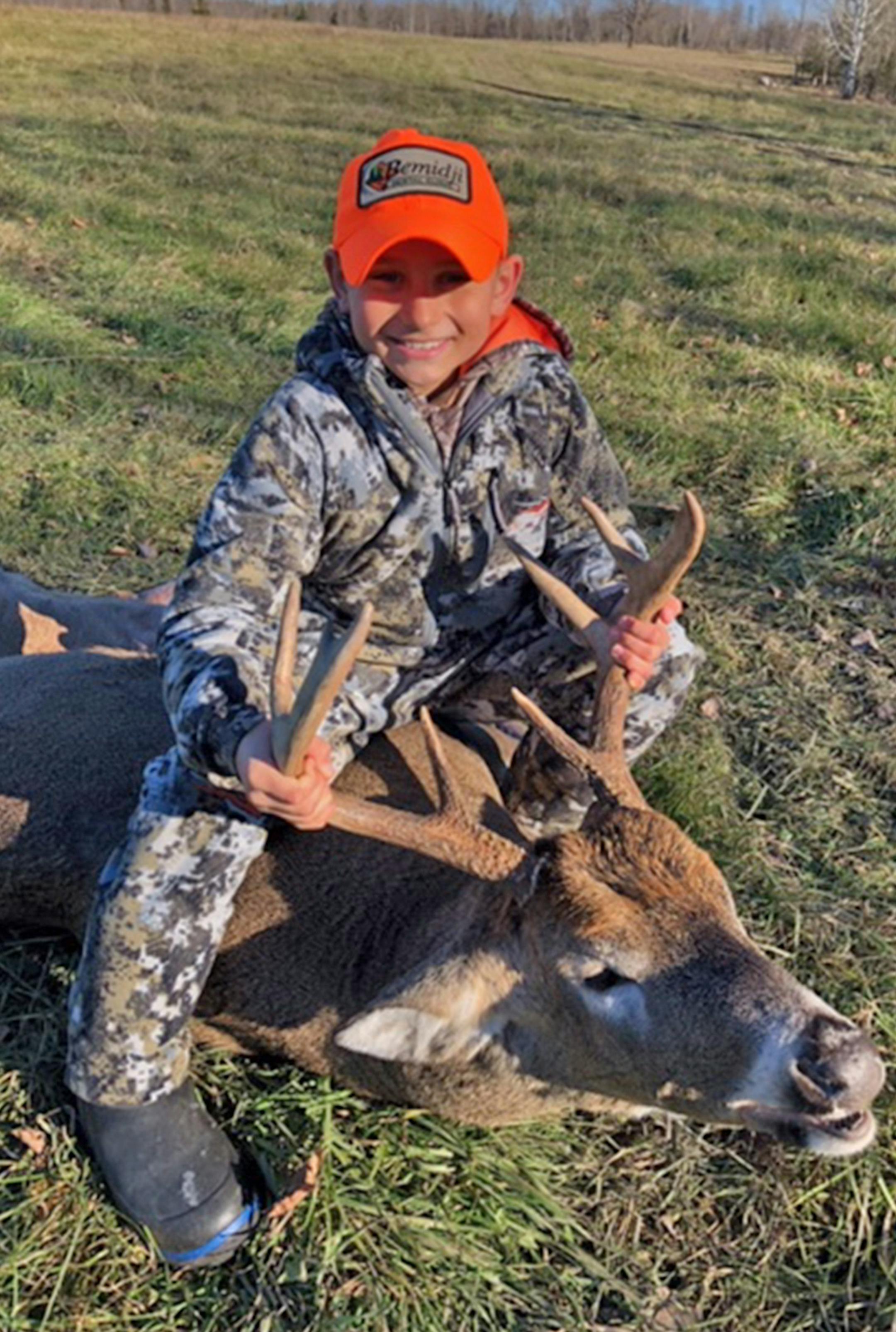 Kash Rasmus of Bemidji shot this monster 9 point buck Nov 4th. His Dad, Greg, helped was Kash's hunting mate. Kash first saw a doe but his dad said to wait for a trailing buck. The deer was estimated to weigh 200 pounds.
