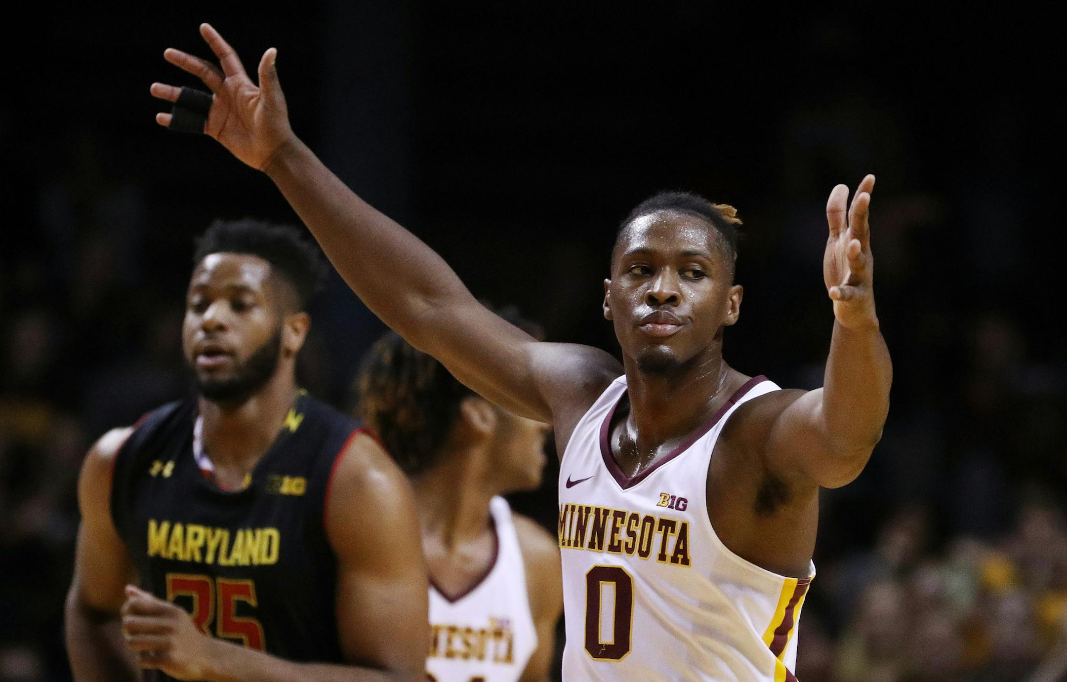 Minnesota Golden Gophers guard Akeem Springs (0) reacts after dunking the ball during the first half. ] ANTHONY SOUFFLE &#x2022; anthony.souffle@startribune.com Game action from an NCAA basketball game between the Minnesota Golden Gophers and the Maryland Terrapins Saturday, Jan. 28, 2016 at Williams Arena on the grounds of the University of Minnesota in Minneapolis.