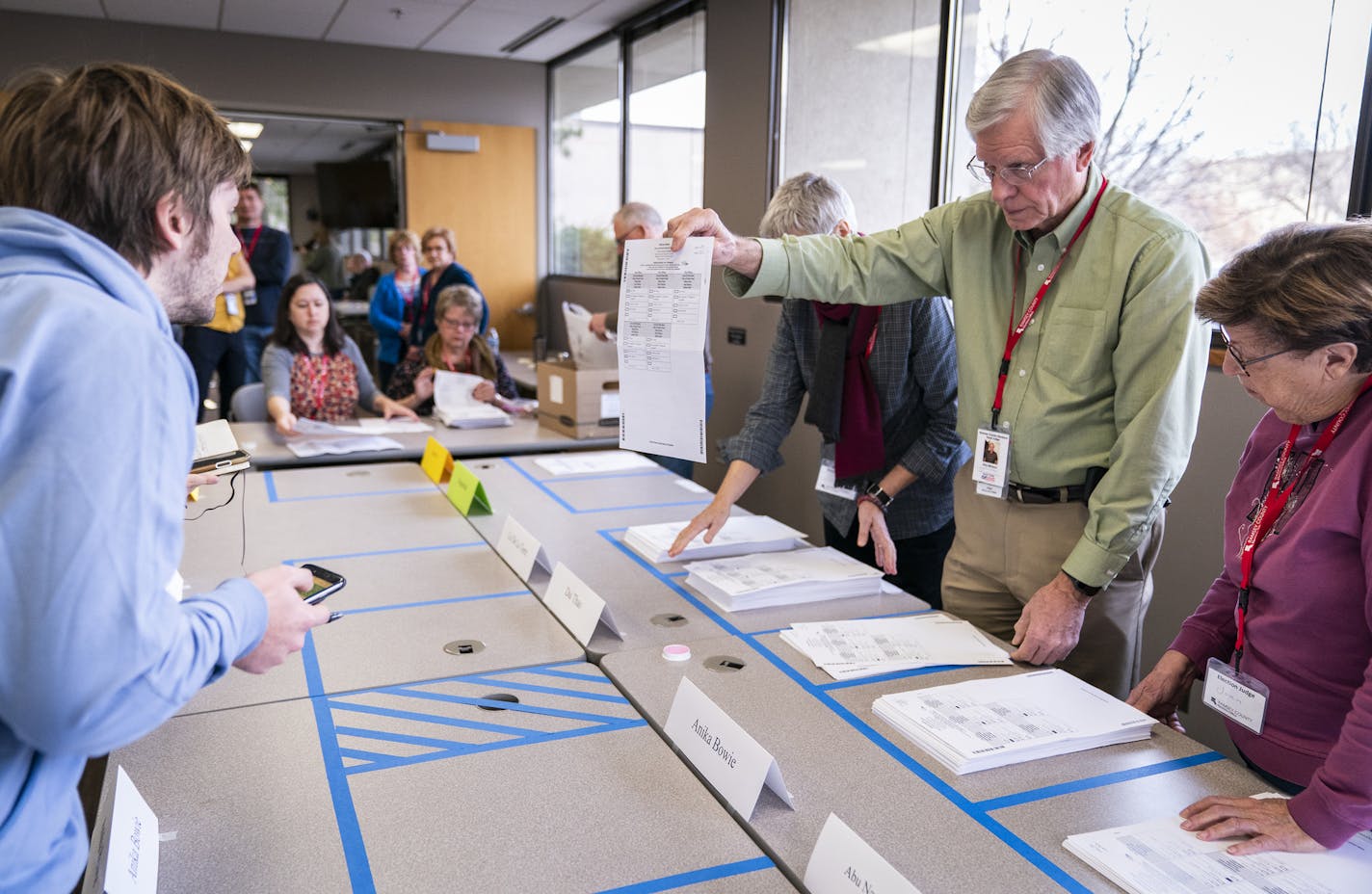 Ramsey County election judge Rick Winters showed a ballot to an observer during the sorting process of the Ward One St. Paul City Council race ballots. ] LEILA NAVIDI &#x2022; leila.navidi@startribune.com BACKGROUND INFORMATION: Ramsey County elections staff conducted the count of ranked-choice votes in the two undecided races for St. Paul City Council at the Ramsey County Elections office in St. Paul on Friday, November 8, 2019.