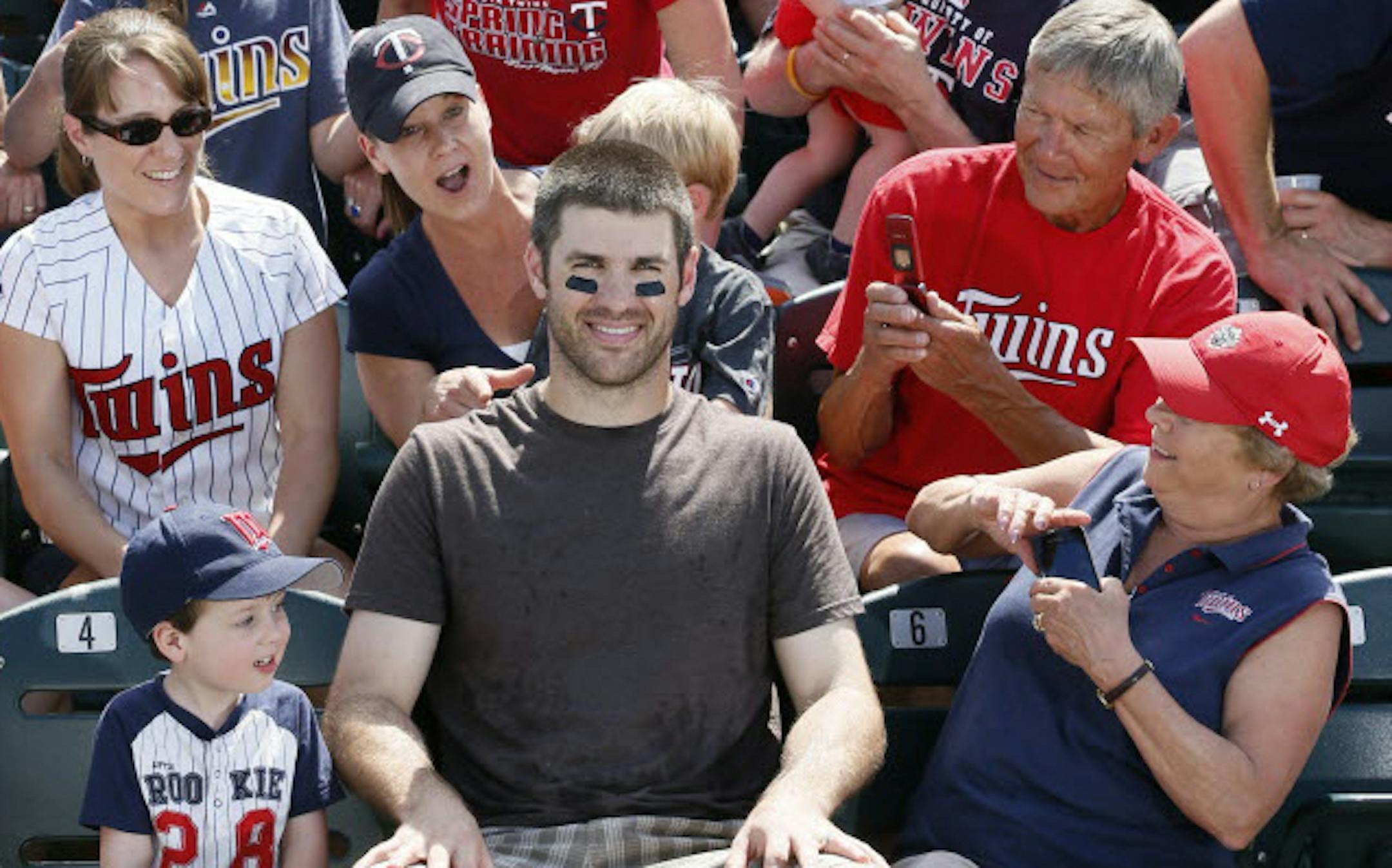 Joe Mauer and fans in Fort Myers, Fla.