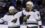 Jason Pominville (left) and Marco Scandella were traded by the Wild to Buffalo. AP Photo/Jeff Roberson