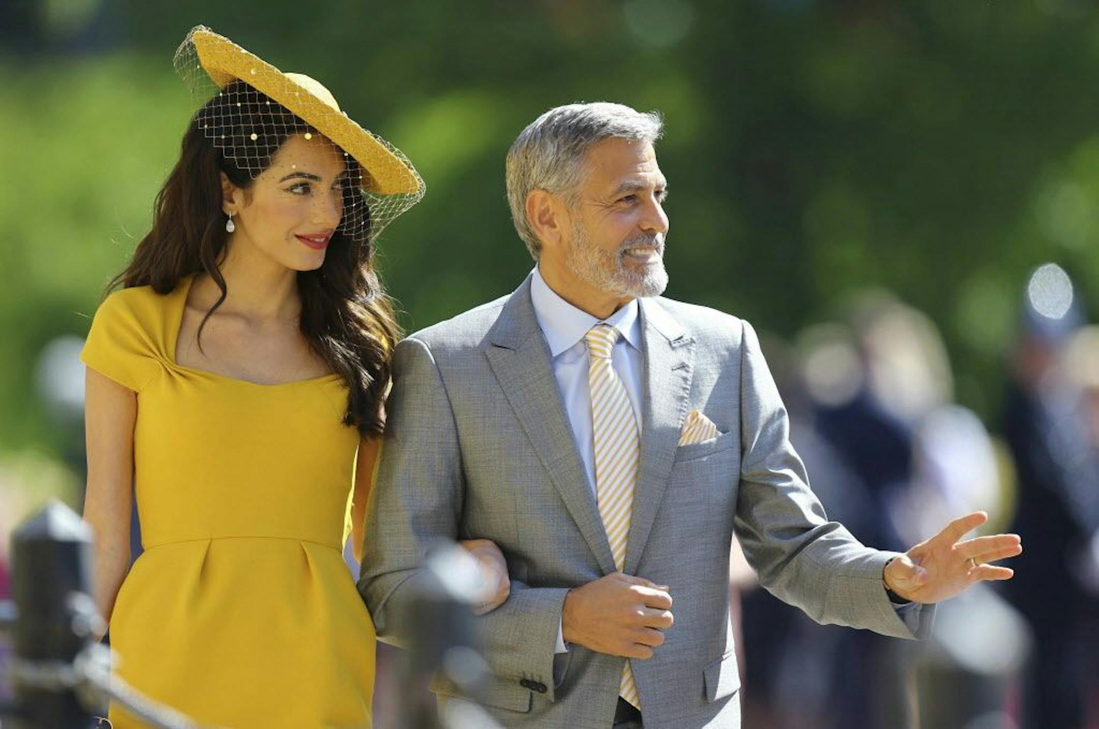 Amal Clooney and George Clooney arrive for the wedding ceremony of Prince Harry and Meghan Markle at St. George's Chapel in Windsor Castle in Windsor, near London, England, Saturday, May 19, 2018.
