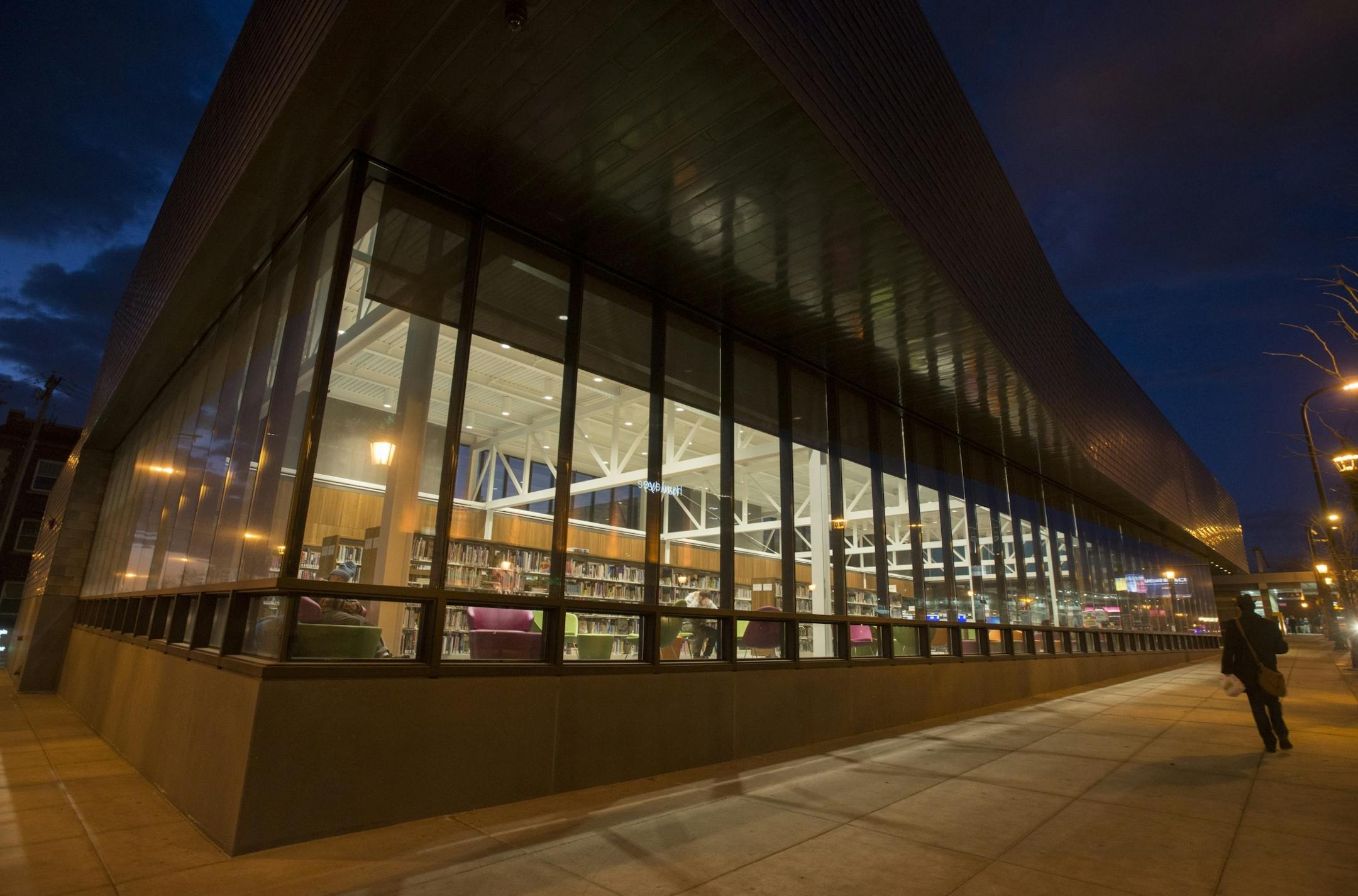 Visitors read inside Walker Library.