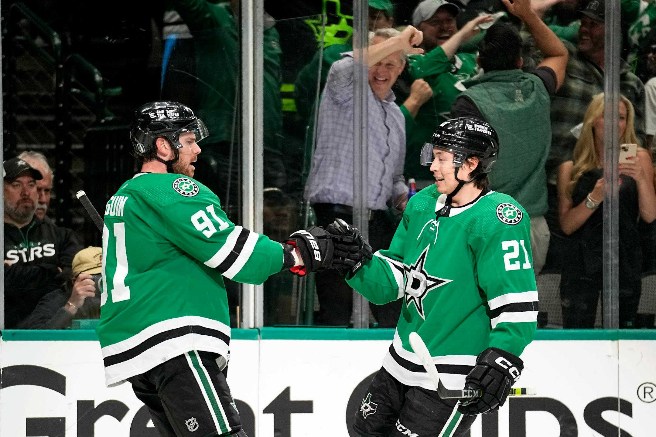 Dallas Stars center Tyler Seguin, left, and left wing Jason Robertson, celebrate after Seguin scored on an assist from Robertson in the first period of Game 2.