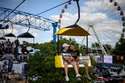 A couple rode the SkyGlider on the last day of the 2022 Minnesota State Fair in Falcon Heights.