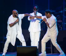 Wanyá Morris, Shawn Stockman, and Nathan Morris, from left, of Boyz II Men early in their set at the State Fair Grandstand in Falcon Heights Sunday n