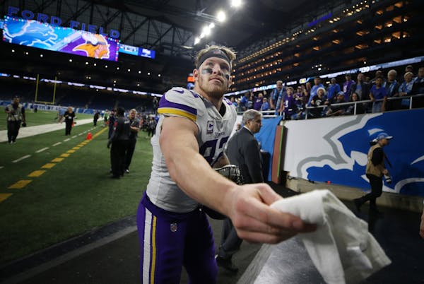 Minnesota Vikings tight end Kyle Rudolph (82) tossed a towel to a fan after the game at Ford Field Sunday December 23, 2018 in Detroit, MI.
