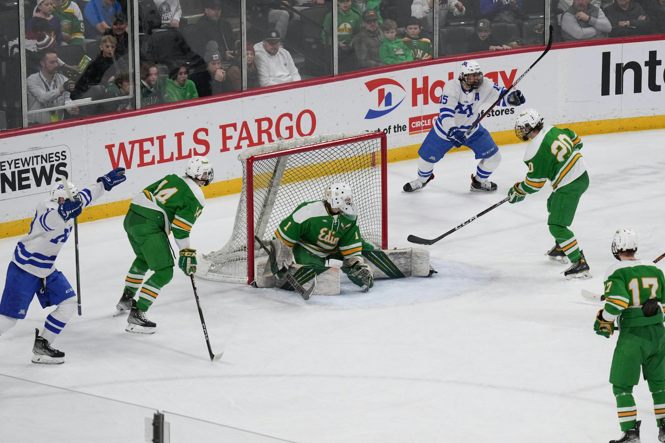 Minnetonka forward Hagen Burrows (19) scores the first goal of the game against Edina in the first period.