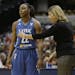 Minnesota Lynx head coach Cheryl Reeve talks with Monica Wright during the first half of a WNBA basketball game against the Indiana Fever Thursday, Ju