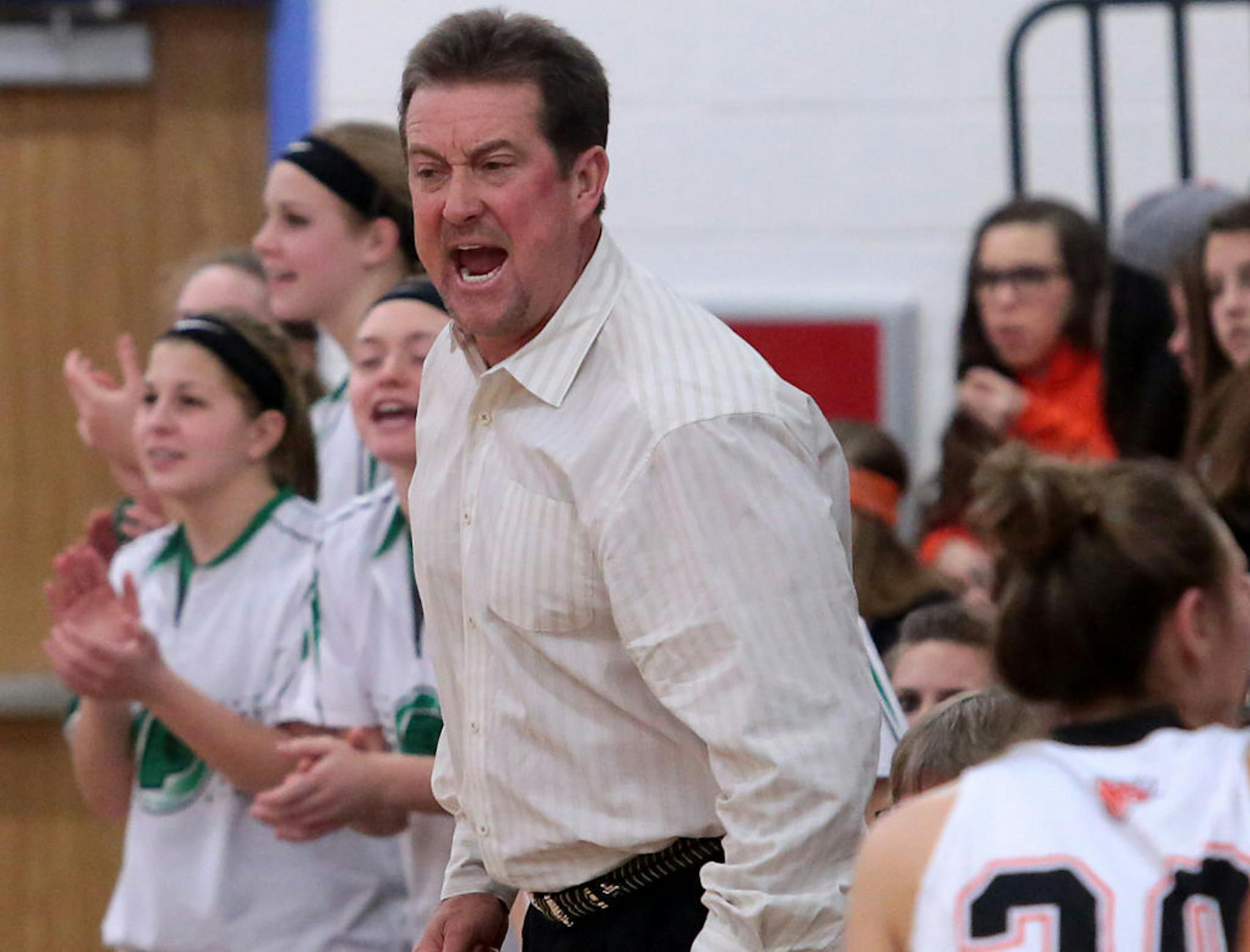 Then-Janesville Parker head coach Tom Klawitter encouraged his team during the first half of a girls' basketball game at Verona High School in Verona, Wis., on Friday, Jan. 30, 2015. (John Hart/Wisconsin State Journal)