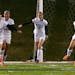 Elisabeth Stout celebrates her goal on Hill-Murray goalkeeper Sophia Fobaire during the second half of the Class 1A Girls' semifinal game Wednesday, O