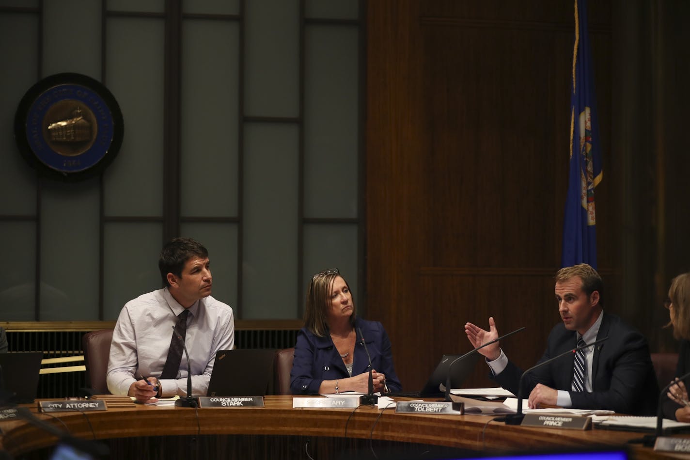 St. Paul City Council member Chris Tolbert, right, sponsor of the the Ford Site Zoning and Public Realm Master Plan, spoke in support of his proposal just before the council voted 5-2 to adopt it. At left was City Council President Russ Stark. Between them was City Clerk Shari Moore .