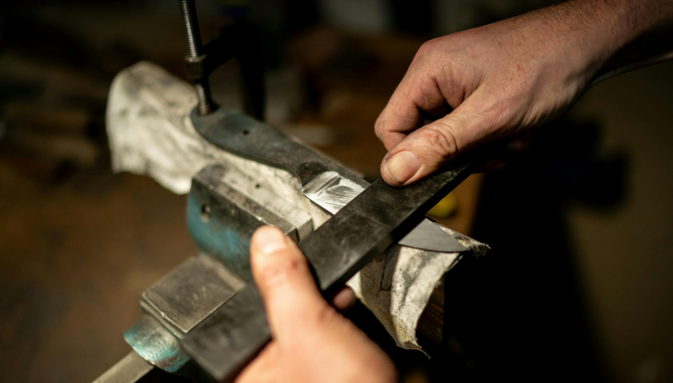 Jason Kraus hand sanded a blade to a shiny finish.