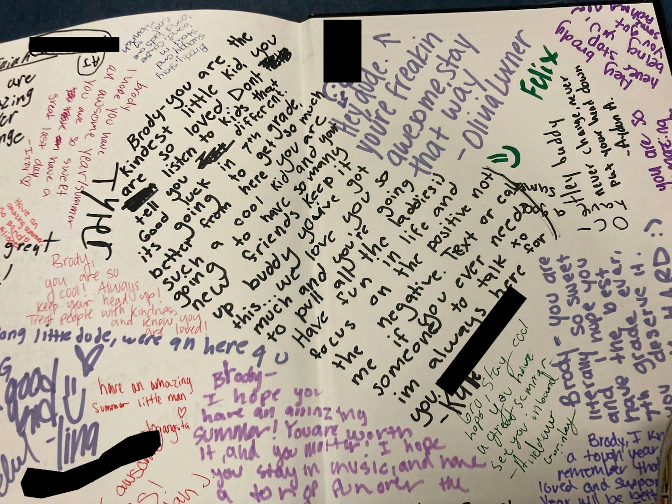 Comments in Brody's yearbook from older students at his school. The Washington Post has redacted students' phone numbers to protect their privacy. MUST CREDIT: Photo courtesy of Cassandra Ridder.