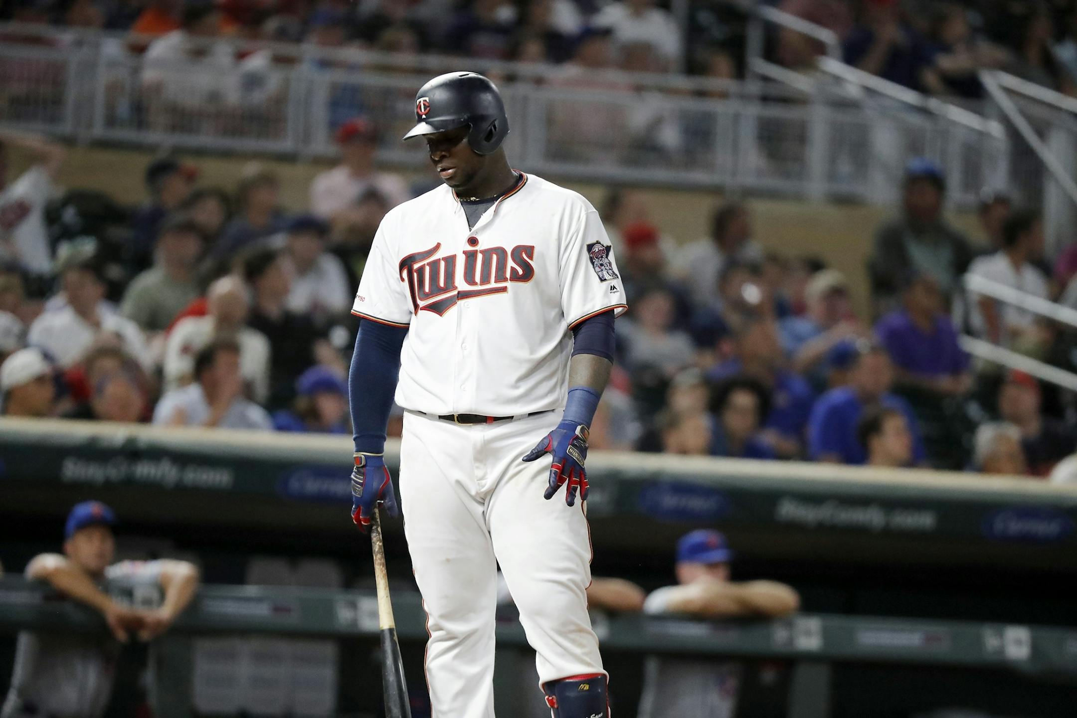 Minnesota Twins third baseman Miguel Sano (22) strikes out in the ninth inning.