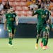 Portland Timbers' Diego Valeri, left, Dairon Asprilla, middle, and Jeremy Ebobisse, right, celebrate the goal by Asprilla during the second half of an