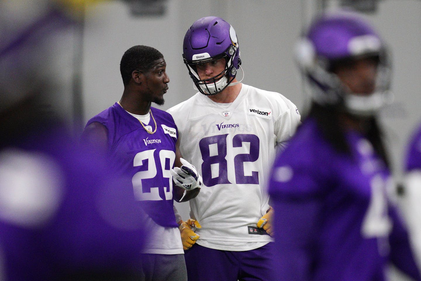 Vikings tight end Kyle Rudolph stood with cornerback Xavier Rhodes during Tuesday's mandatory minicamp.