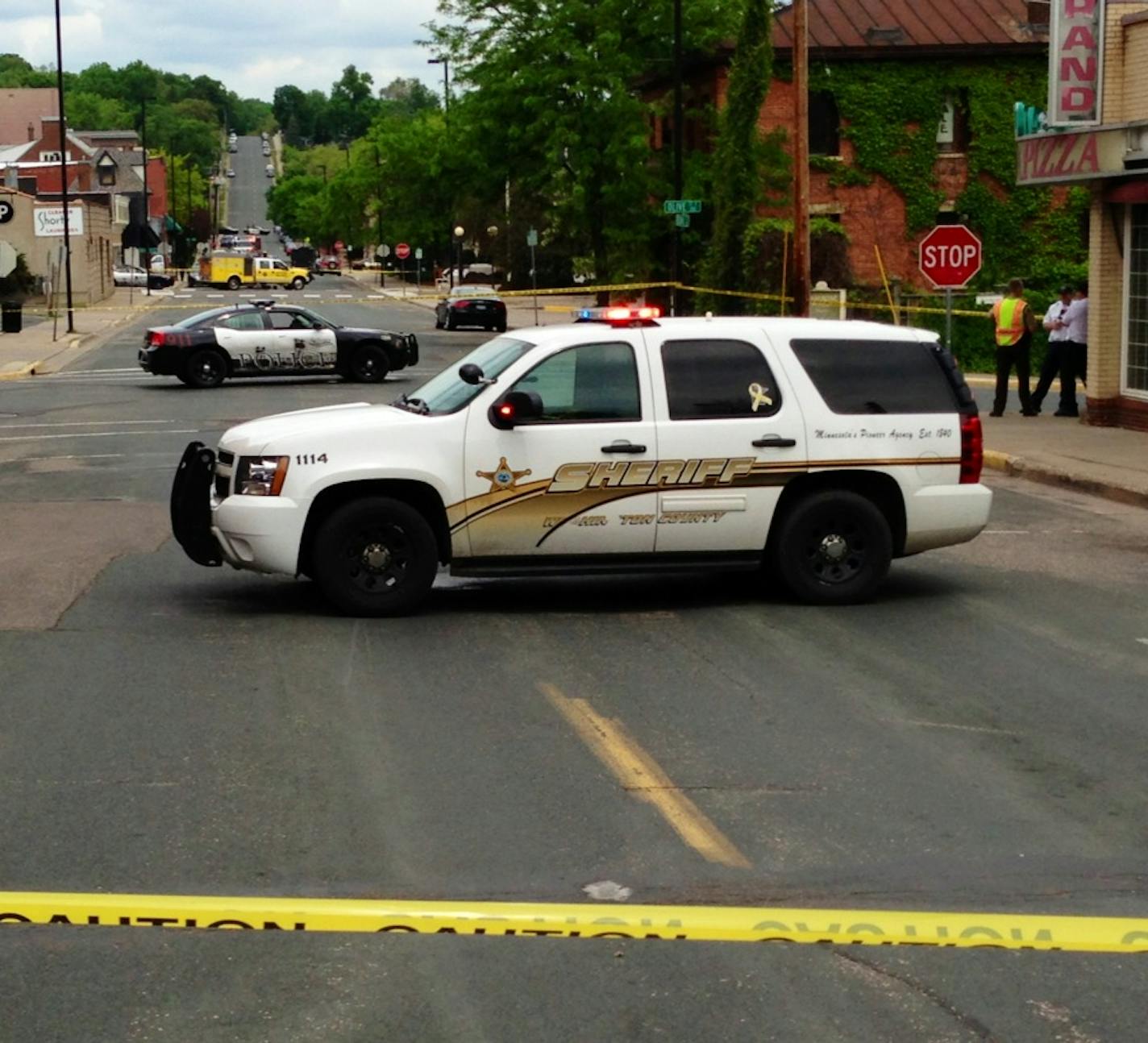 Law enforcement vehicles in Stillwater on Saturday.