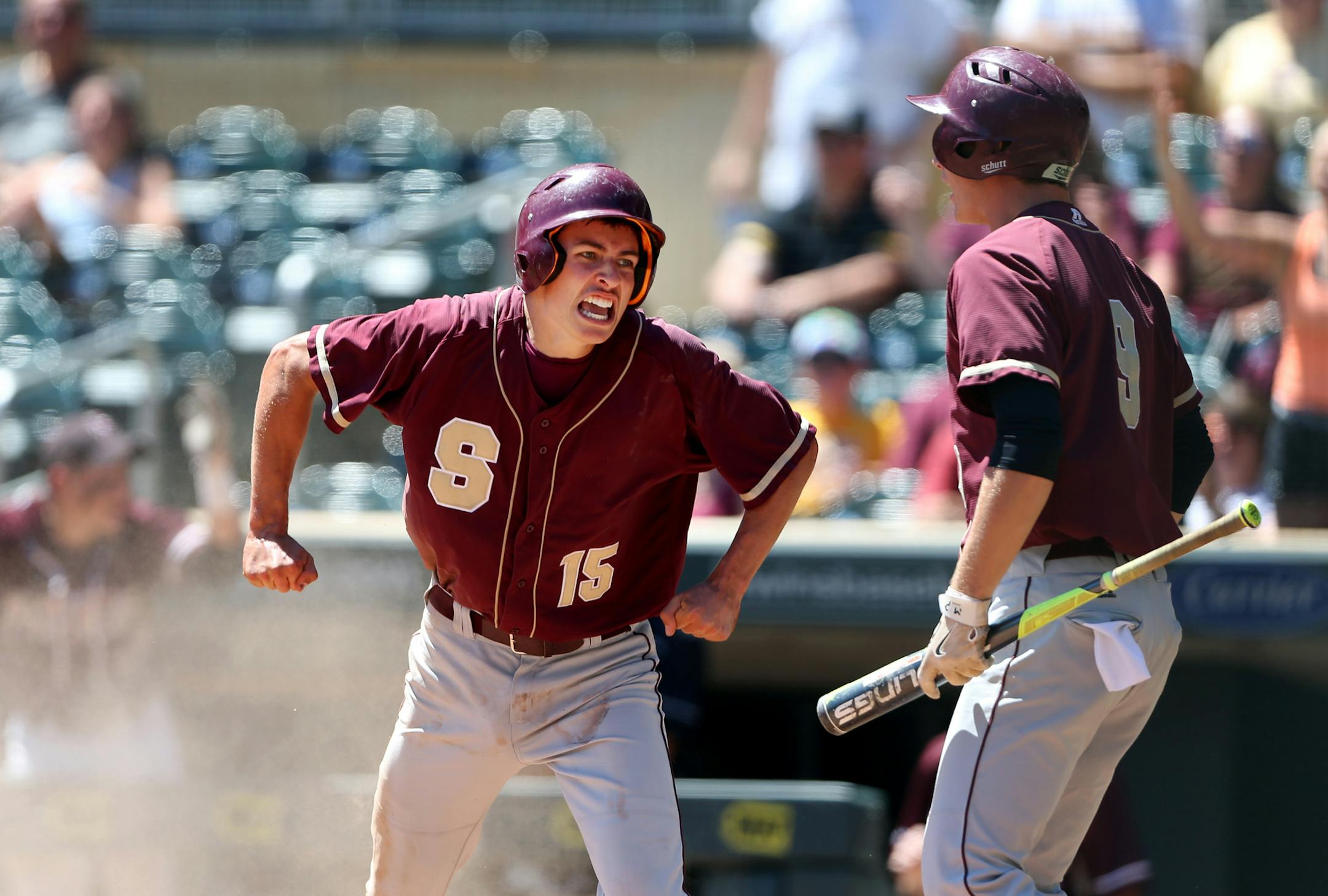 Joe Pieschel left, celebrated with Tanner Vogel after scoring the winning run for Springfield in the eleventh inning at Target Field Monday June 20, 2016 in Minneapolis, MN.] Class 1A championship game between the Springfield Tigers who beat the Parkers Prairie Panthers 4-2 in eleven innings. Jerry Holt /Jerry.Holt@Startribune.com