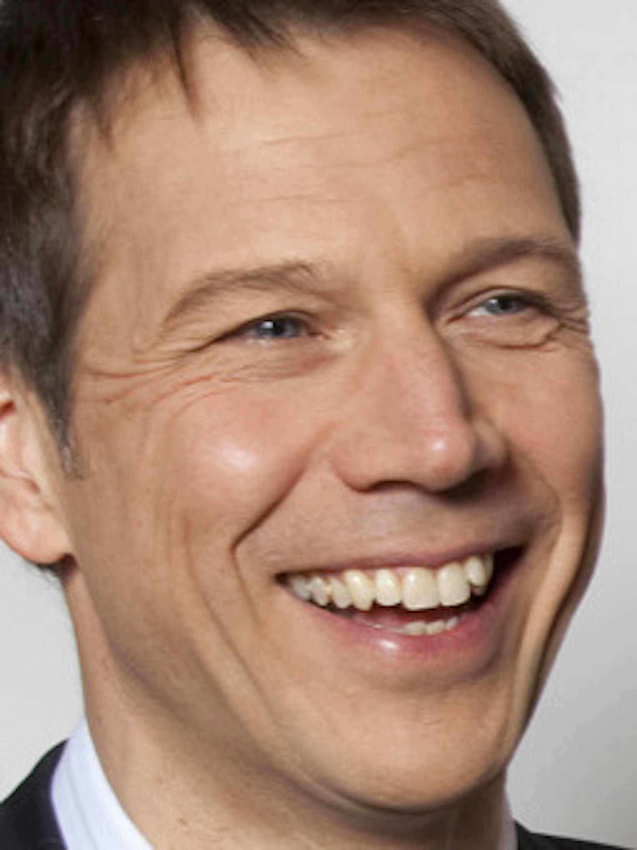 AT&T Chairman and CEO Randall Stephenson and Deutsche Telekom Chairman and CEO Rene Obermann meet after announcing AT&T's $39 billion acquisition of T-Mobile USA from its German parent, New York, Monday March 21, 2011. Photo taken by newscast for AT&T.(Mark Dye/newscast)