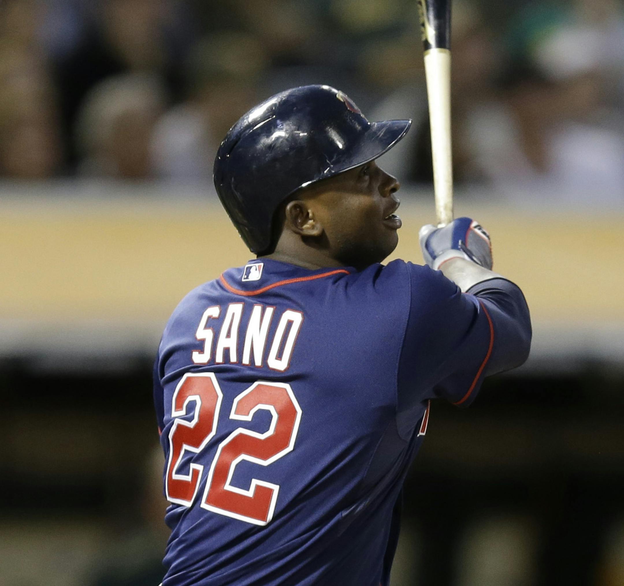 Minnesota Twins' Miguel Sano follows through on an RBI sacrifice fly off Oakland Athletics Tyler Clippard during the ninth inning of a baseball game Saturday, July 18, 2015, in Oakland, Calif. (AP Photo/Ben Margot) ORG XMIT: MIN2015072417081354