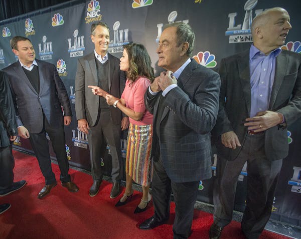 The NBC sports broadcasting team, from left, Mark Lazarus, Cris Collinsworth, Michele Tafoya, Al Michaels, and Drew Esocoff, met with a room filled wi