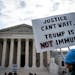 Protesters outside the Supreme Court in Washington, D.C., demonstrate against the argument that former President Donald Trump has “absolute immunity