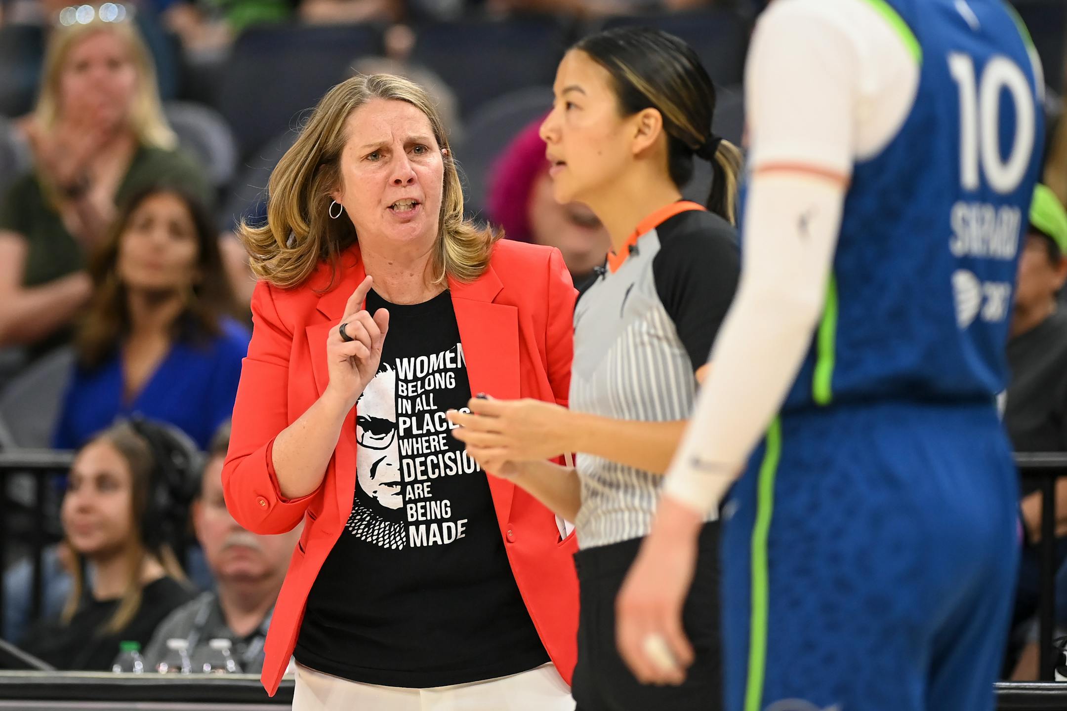 Minnesota Lynx head coach Cheryl Reeve gives an earful to referee Catherine Chang late in the fourth quarter.