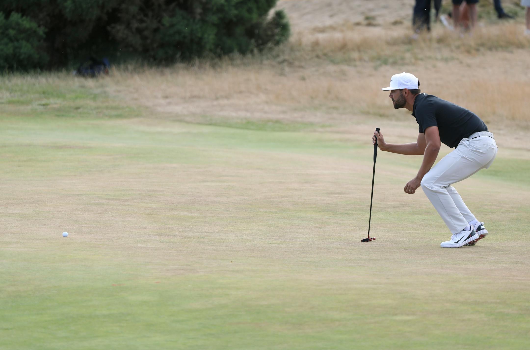 Erik Van Rooyen of South Africa lines up a putt on the 12th green during the third round of the British Open Golf Championship in Carnoustie, Scotland, Saturday July 21, 2018. (AP Photo/Peter Morrison)