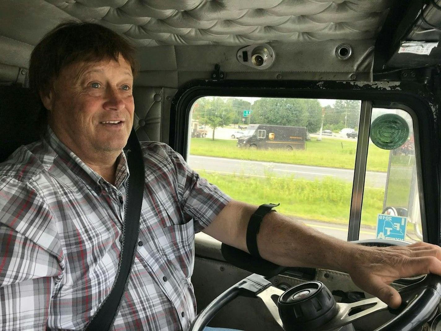 Truck driver Terry Button drives his truck near Opal, Va., Thursday, June 13, 2019. The Transportation Department is poised to relax the federal regulations that govern how many hours a day truckers can be behind the wheel, a long sought goal of the trucking industry.